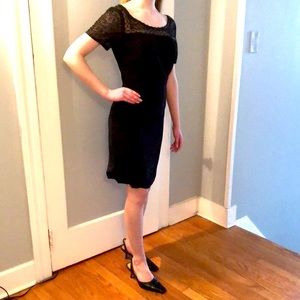 Black short sleeve beaded knee length cocktail dress.
